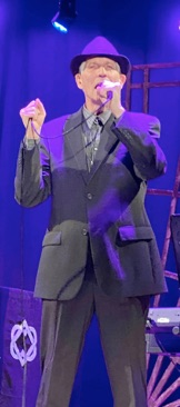 The Spirit of Leonard Cohen show Leonard mic front