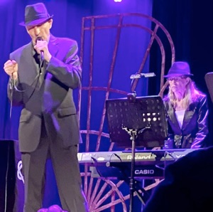 The Spirit of Leonard Cohen show Leonard mic with Janet Brewer keys
